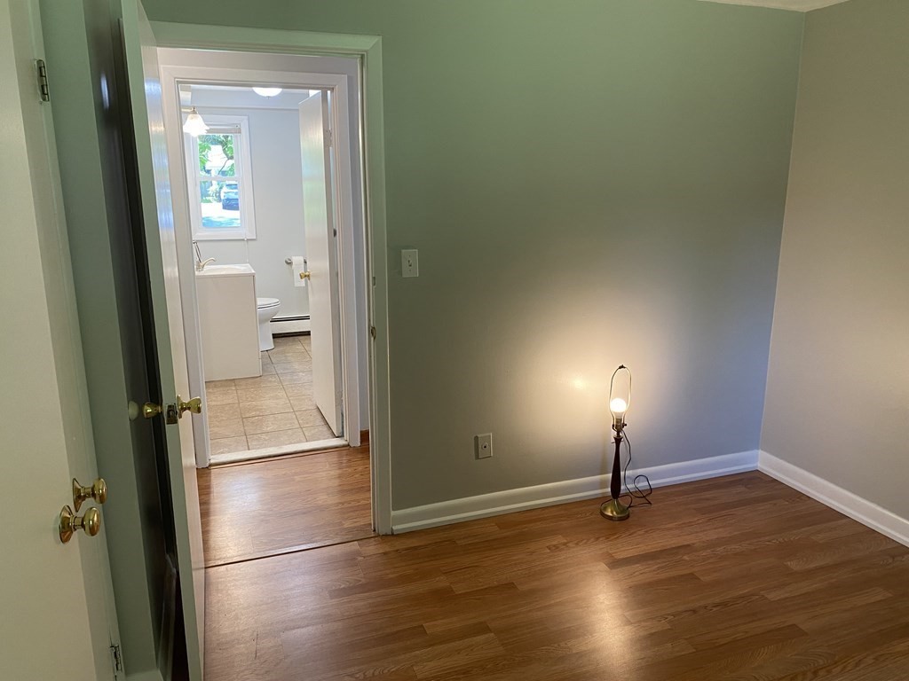 28 Savoy Road Framingham, MA 01701 - Photo 28 of 42 a view of empty room with wooden floor