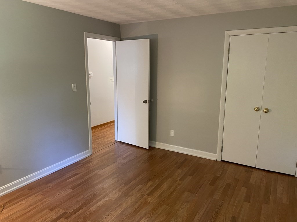 28 Savoy Road Framingham, MA 01701 - Photo 30 of 42 a view of an empty room with wooden floor