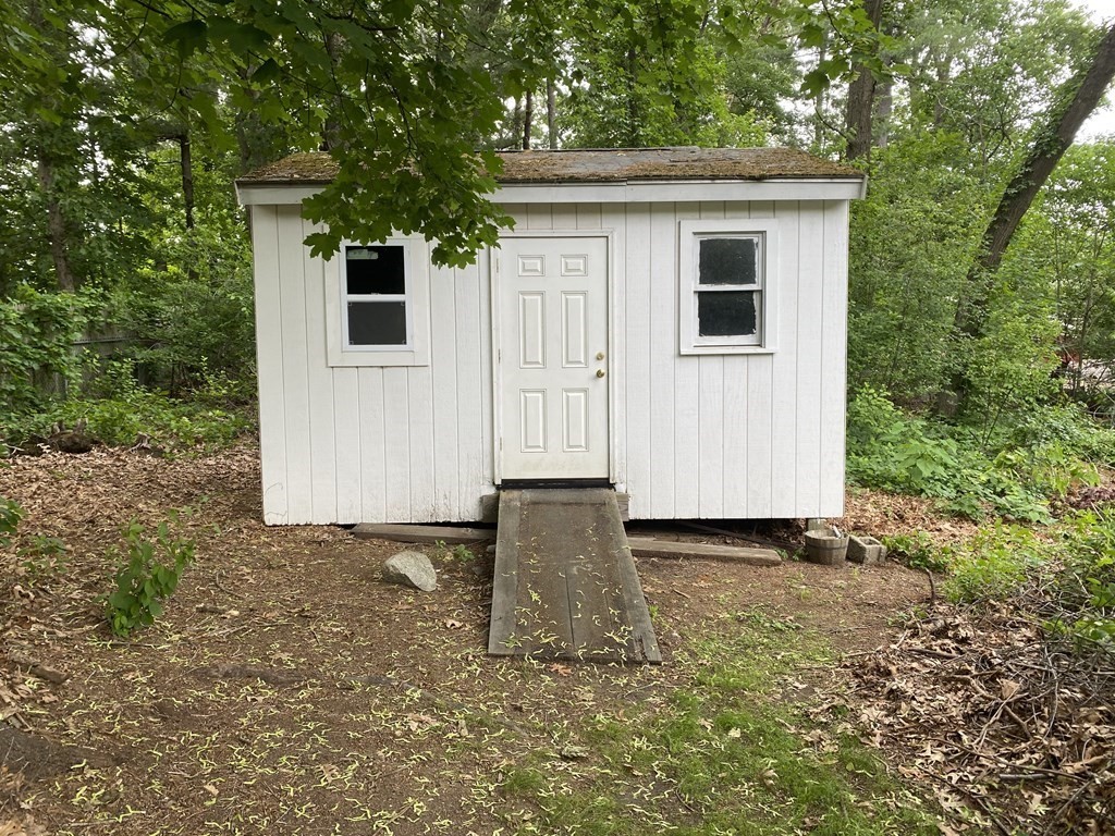 28 Savoy Road Framingham, MA 01701 - Photo 37 of 42 a view of a house with backyard and trees
