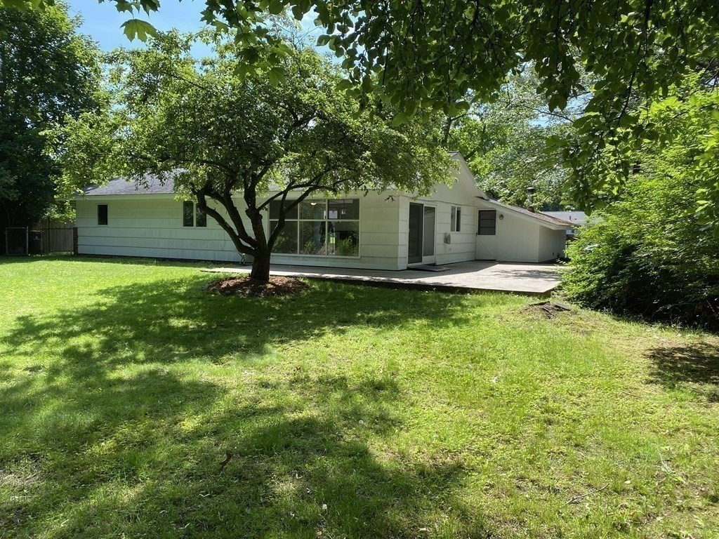 28 Savoy Road Framingham, MA 01701 - Photo 39 of 42 a front view of a house with garden