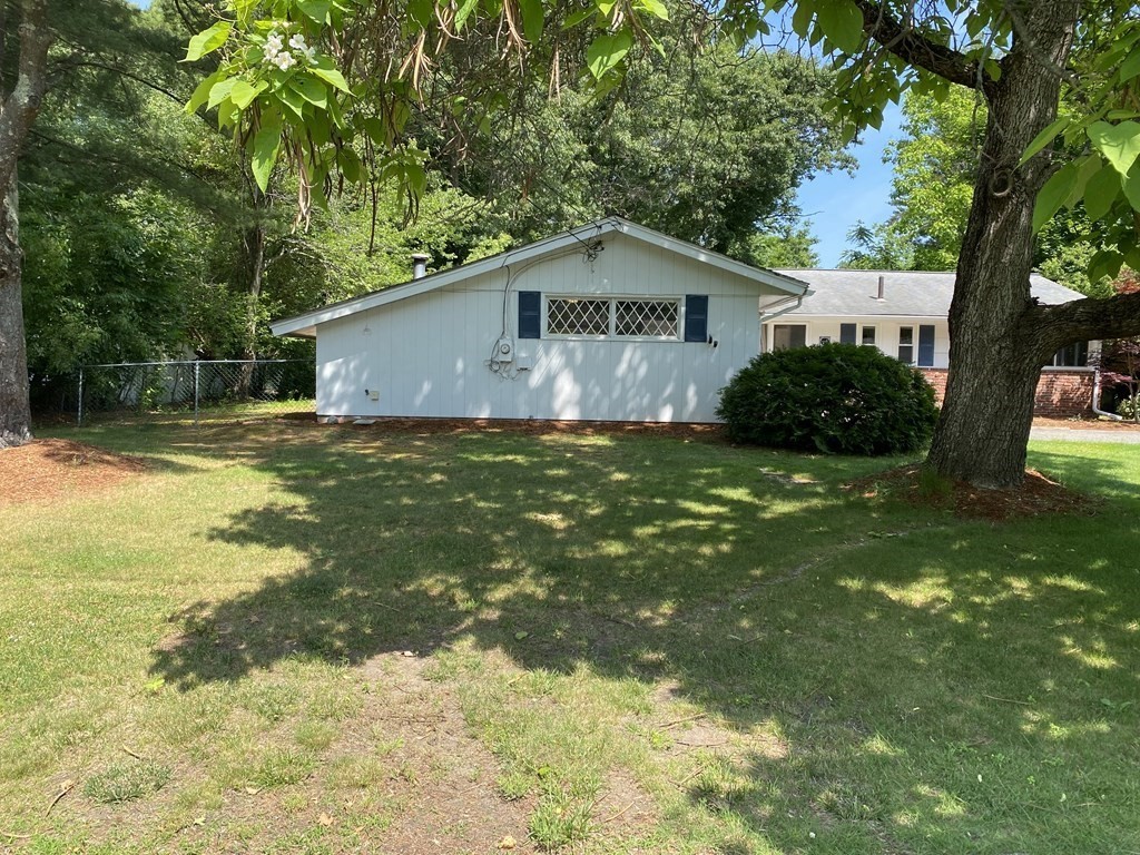 28 Savoy Road Framingham, MA 01701 - Photo 41 of 42 a front view of house with yard and green space