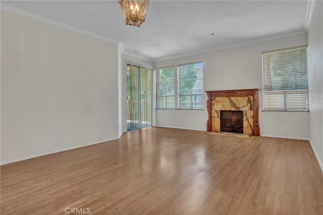 a view of hallway with wooden floor