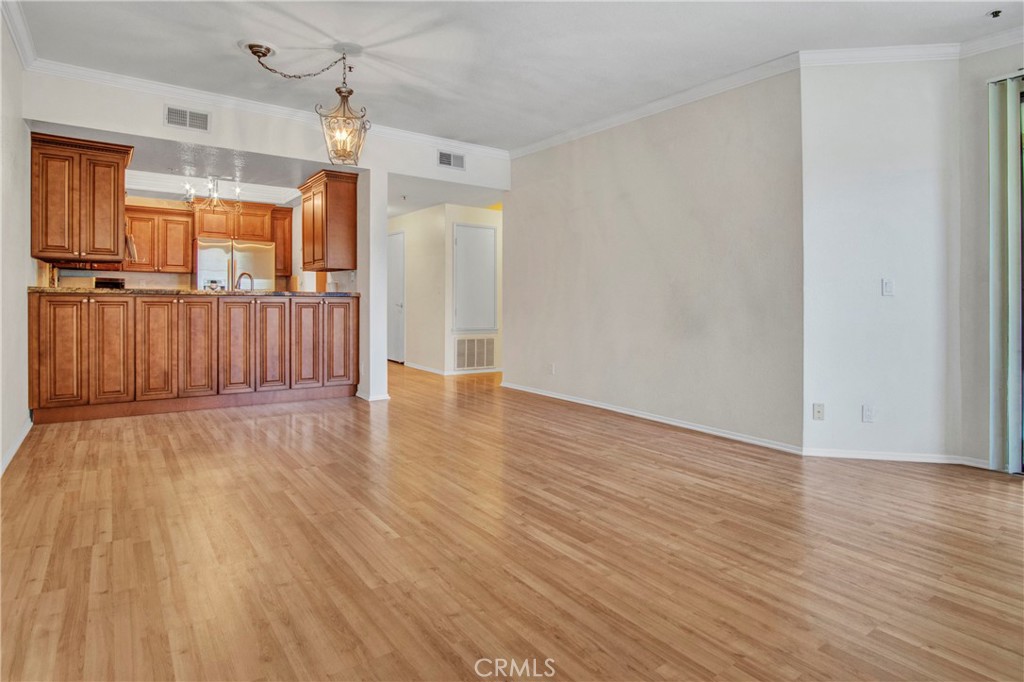 2571 Plaza Del Amo, Unit 107 Torrance, CA 90503 - Photo 6 of 33 a view of hallway with wooden floor