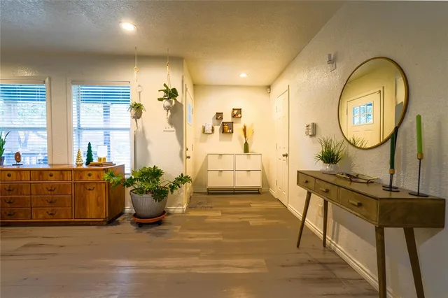a view of a living room and bathroom