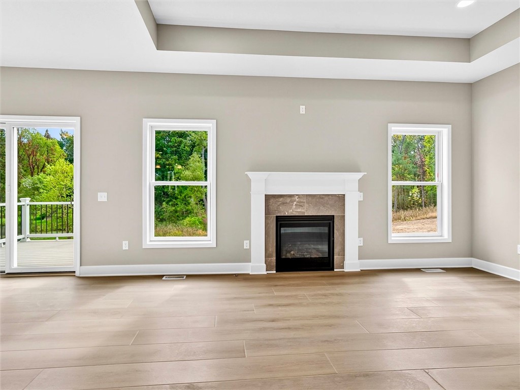 1119 Wall Road Webster, NY 14580 - Photo 18 of 49 Great room with gas fireplace