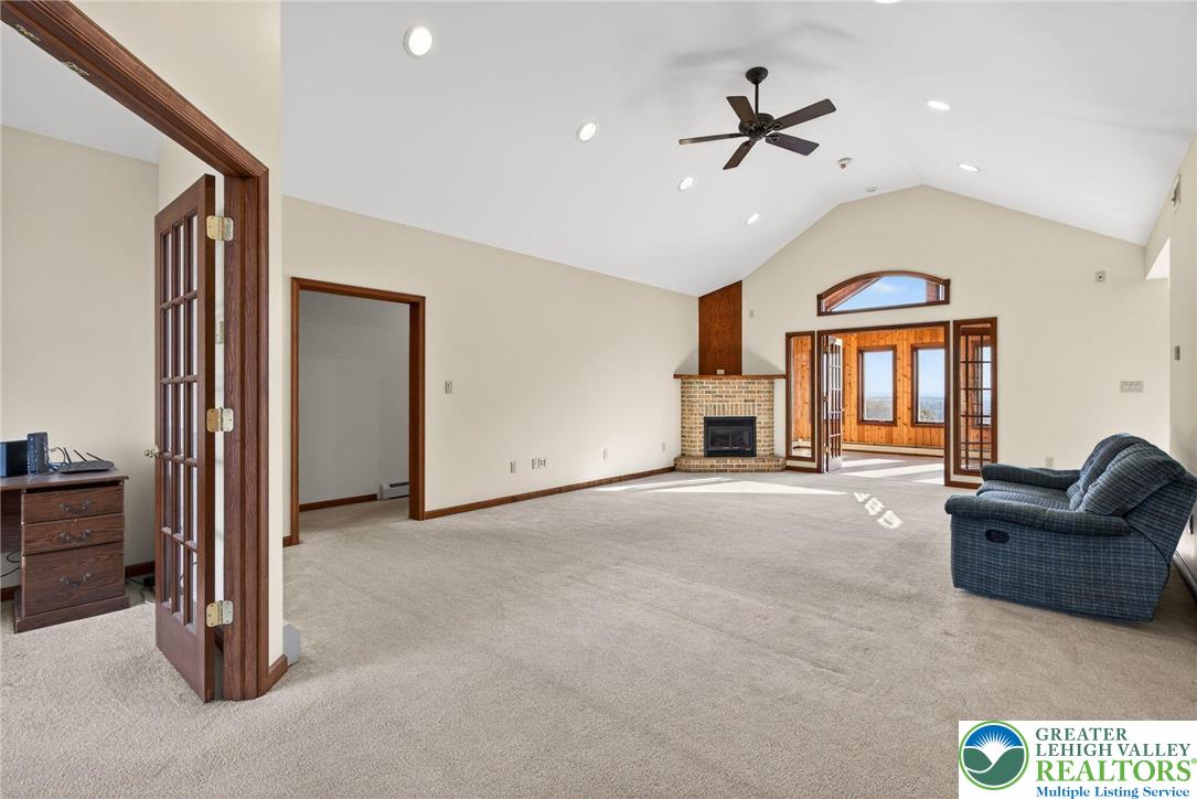 3338 Spring Valley Road Slatington, PA 18080 - Photo 13 of 53 a living room with furniture and a ceiling fan
