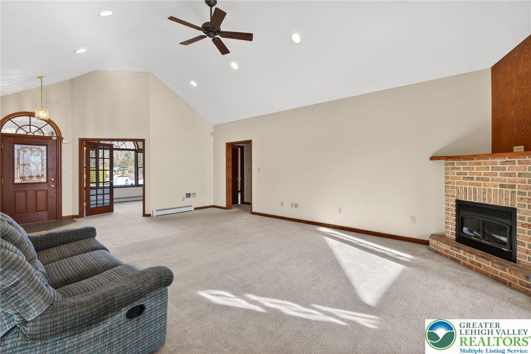 3338 Spring Valley Road Slatington, PA 18080 - Photo 16 of 53 a living room with furniture and a fireplace