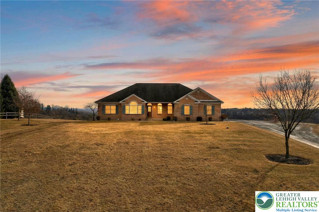 3338 Spring Valley Road Slatington, PA 18080 - Photo 2 of 53 a front view of a house with a yard