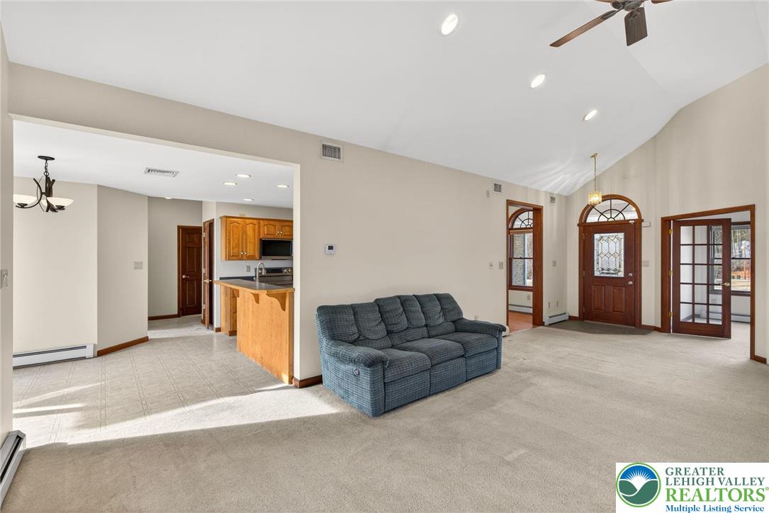 3338 Spring Valley Road Slatington, PA 18080 - Photo 24 of 53 a living room with furniture and a kitchen area