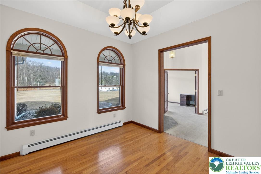 3338 Spring Valley Road Slatington, PA 18080 - Photo 34 of 53 a view of room with window and wooden floor