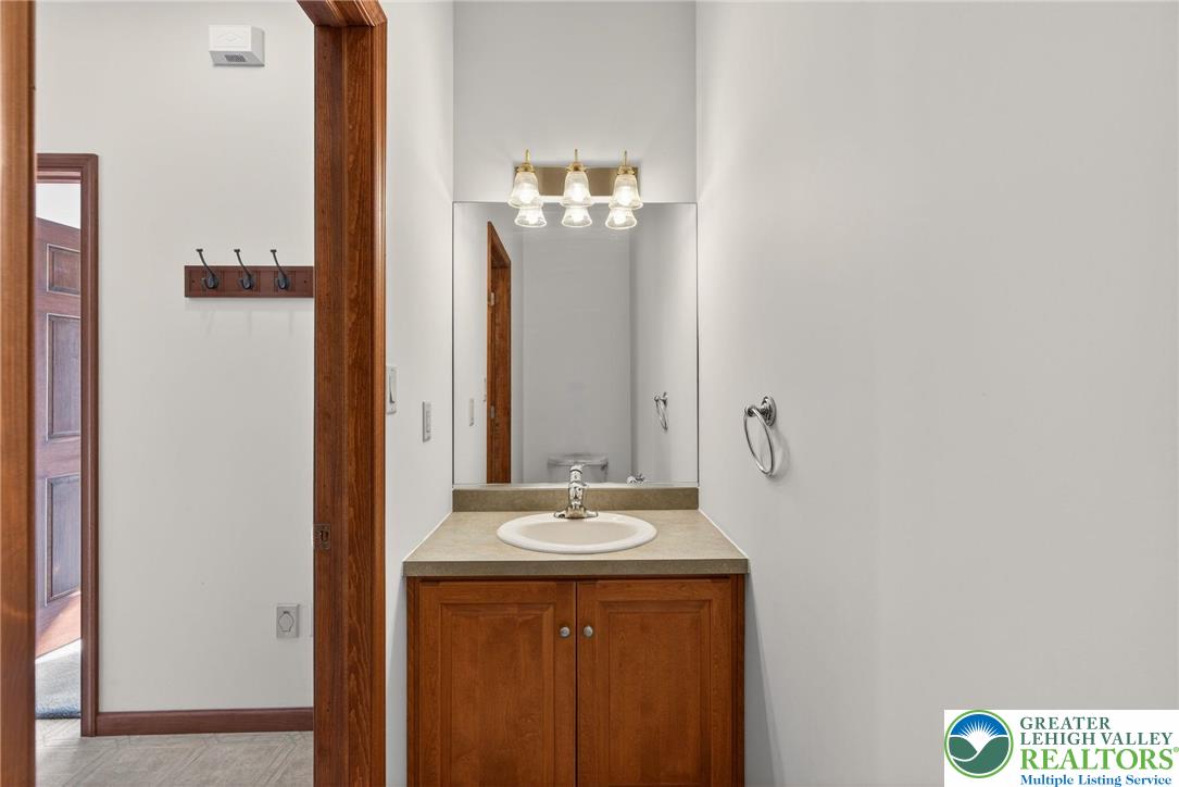 3338 Spring Valley Road Slatington, PA 18080 - Photo 44 of 53 a bathroom with a sink and a mirror