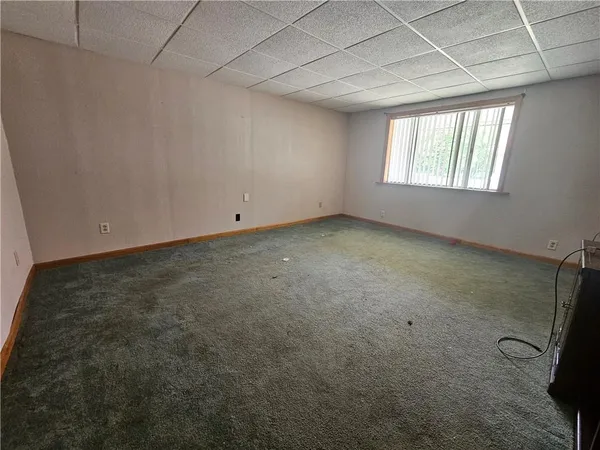 a view of a room that has a window in it