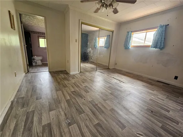 wooden floor in a hall with an entryway