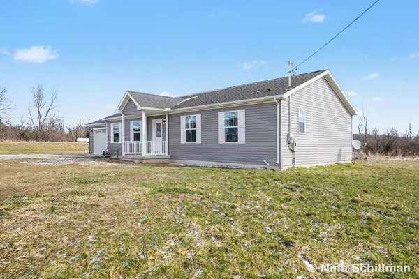 $320,000 | 2406 Newaygo Road, Kent City, MI 49330