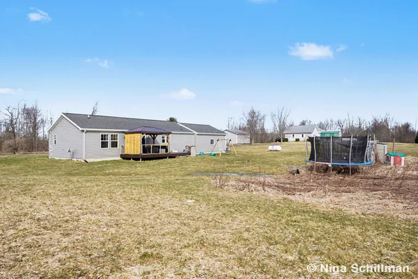 $320,000 | 2406 Newaygo Road, Kent City, MI 49330