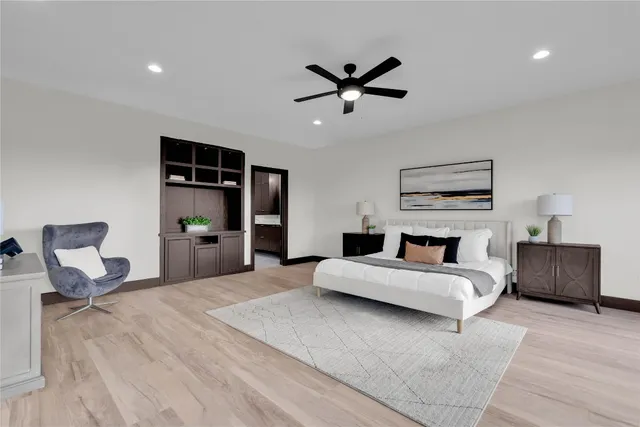 a bedroom with furniture and window