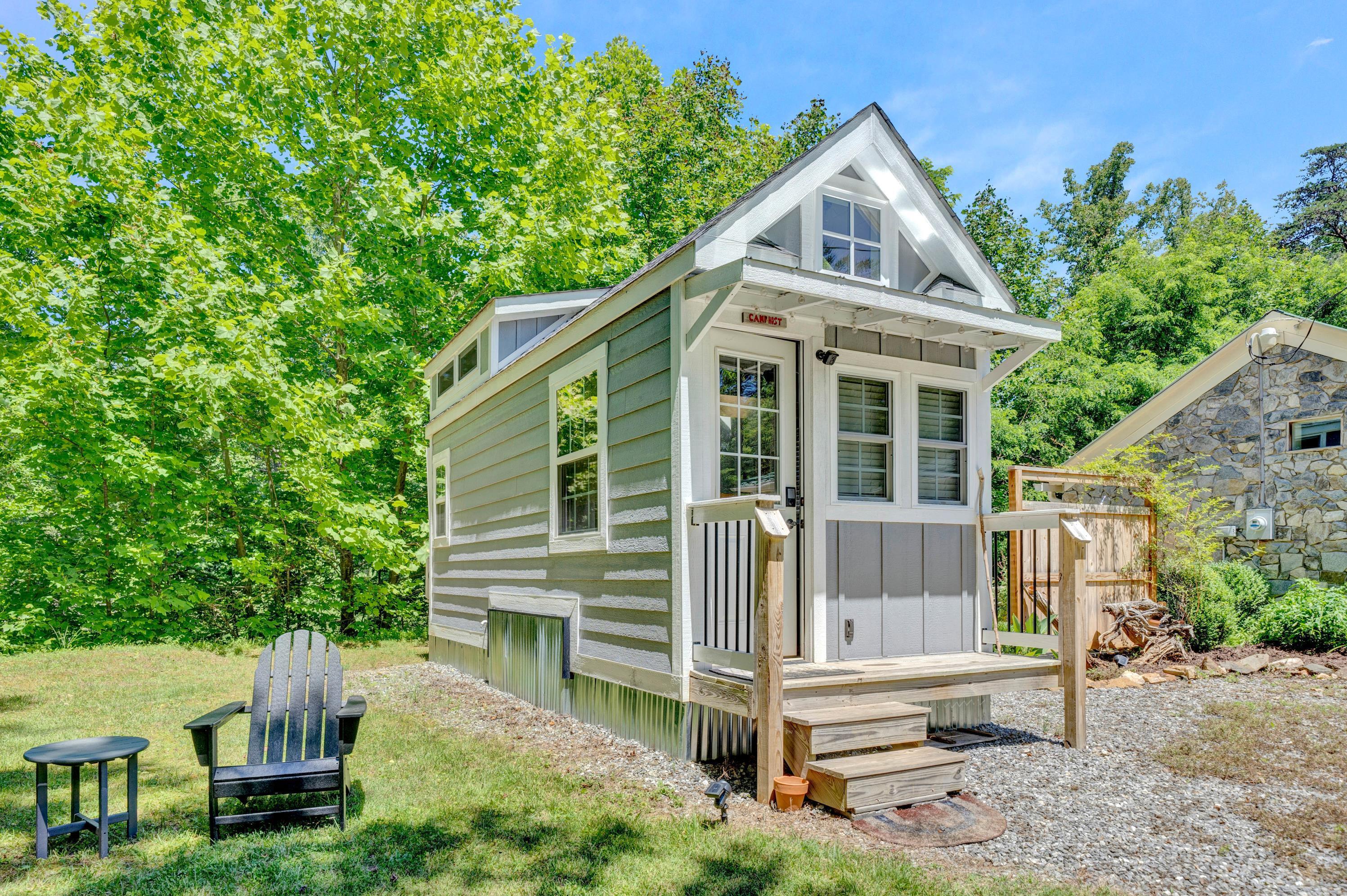 670 Twin Ridge Marina Road Henry, VA 24102 - Photo 33 of 87 a front view of a house with a garden