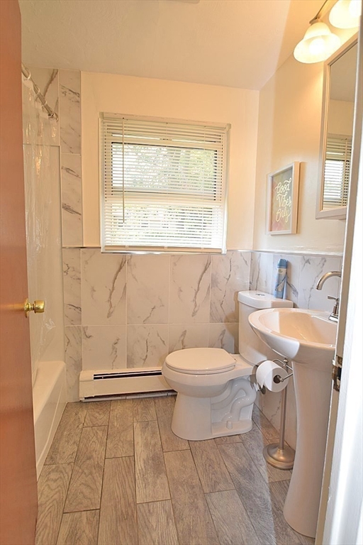 22 Devine Road Randolph, MA 02368 - Photo 16 of 27 a bathroom with a sink toilet and shower