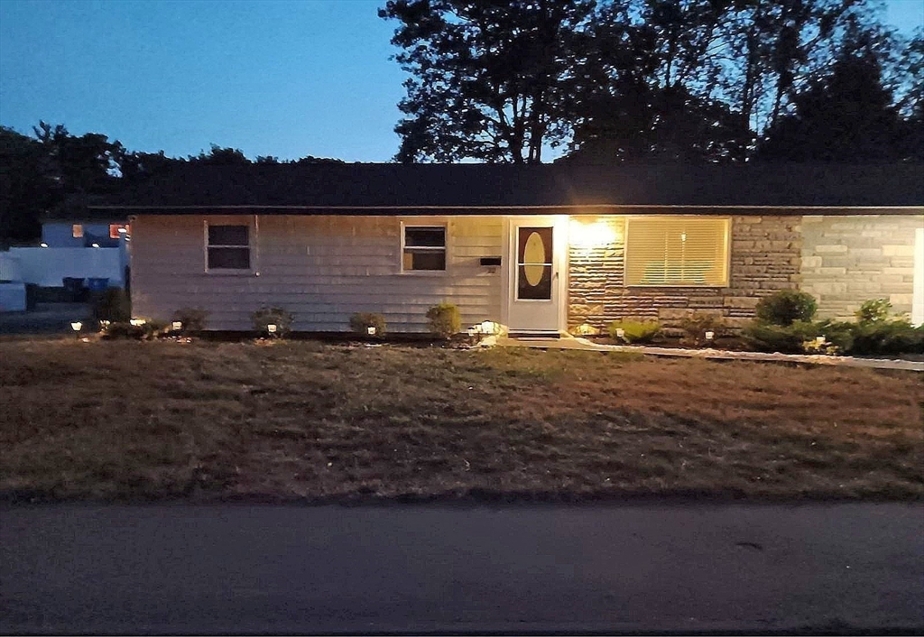 22 Devine Road Randolph, MA 02368 - Photo 2 of 27 a view of a yard with an outdoor space
