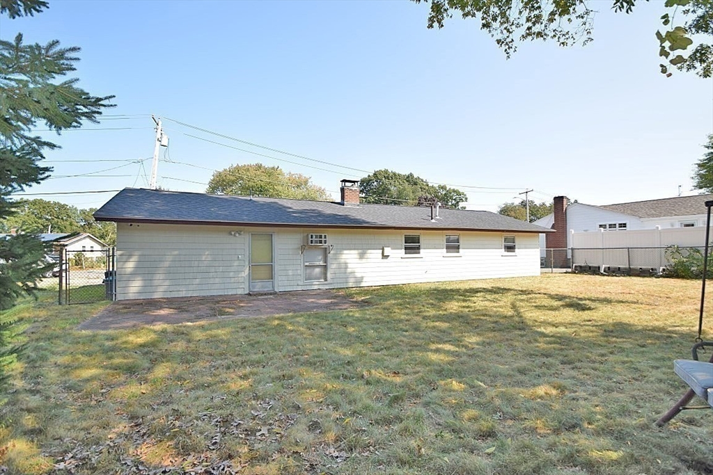 22 Devine Road Randolph, MA 02368 - Photo 22 of 27 a view of a house with a yard
