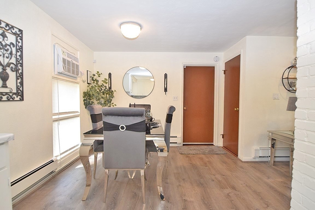 22 Devine Road Randolph, MA 02368 - Photo 7 of 27 a workspace with furniture and window