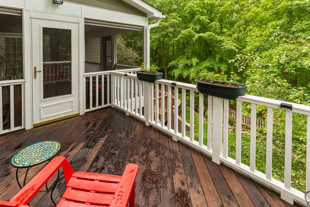 2728 Sunnystone Way Raleigh, NC 27613 - Photo 16 of 30 a balcony with wooden floor and outdoor space