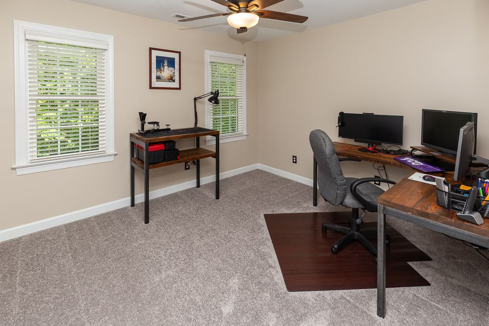 2728 Sunnystone Way Raleigh, NC 27613 - Photo 23 of 30 a work room with furniture and windows