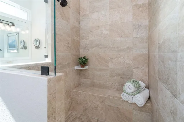 a bedroom with bed and window