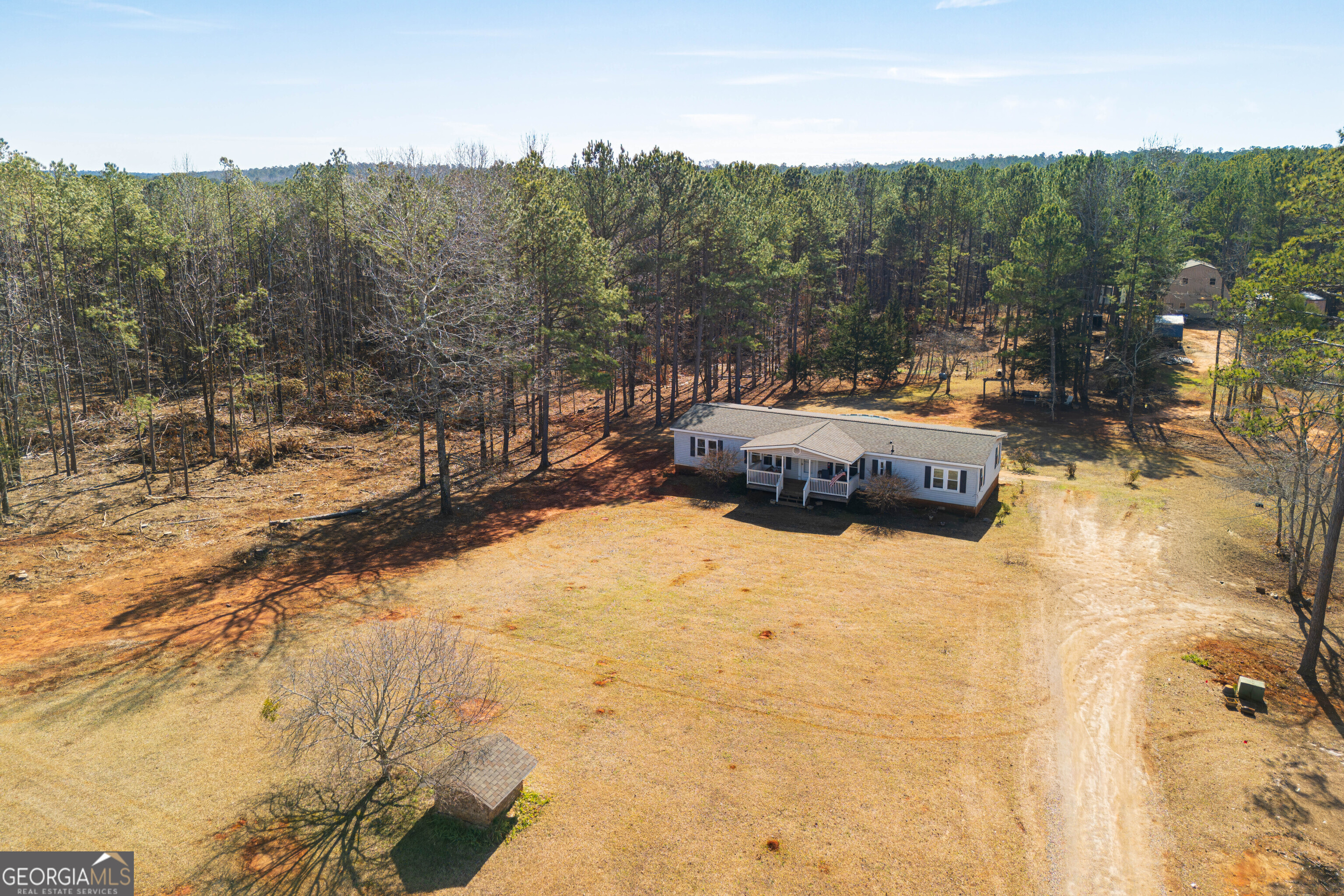 161 Cherokee Trail Forsyth, GA 31029 - Photo 26 of 32 a view of a swimming pool with a yard