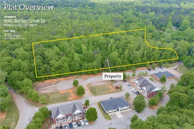 a view of a swimming pool with a balcony