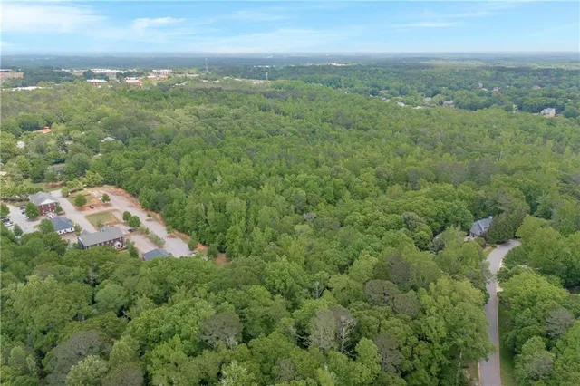 a view of a city with an ocean