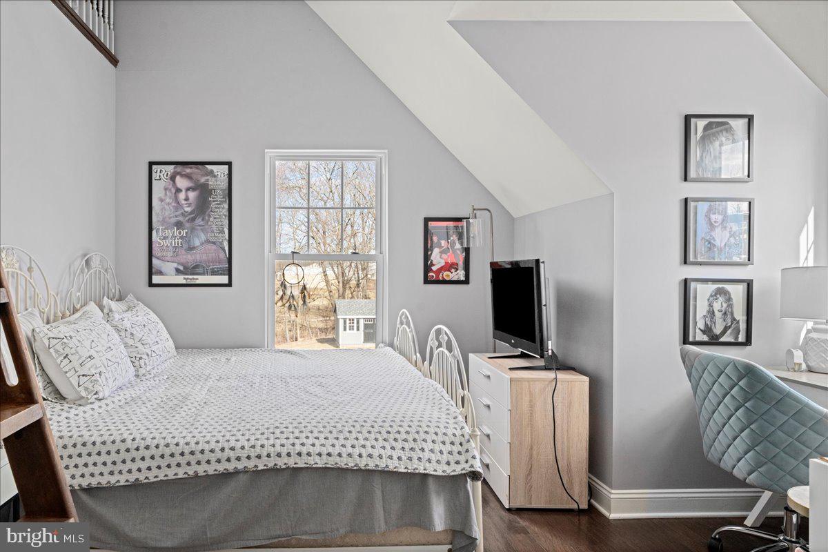 502 East Creamery Road Perkasie, PA 18944 - Photo 33 of 58 a bedroom with a bed and wooden floor