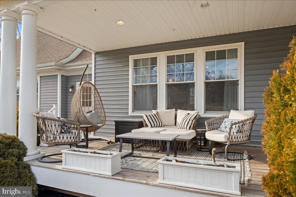 502 East Creamery Road Perkasie, PA 18944 - Photo 4 of 58 a outdoor space with patio furniture and a potted plant