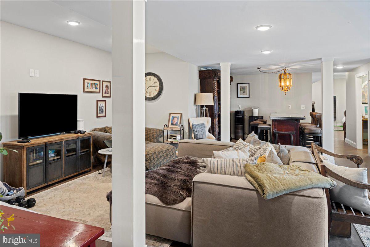 502 East Creamery Road Perkasie, PA 18944 - Photo 41 of 58 a living room with furniture and a flat screen tv