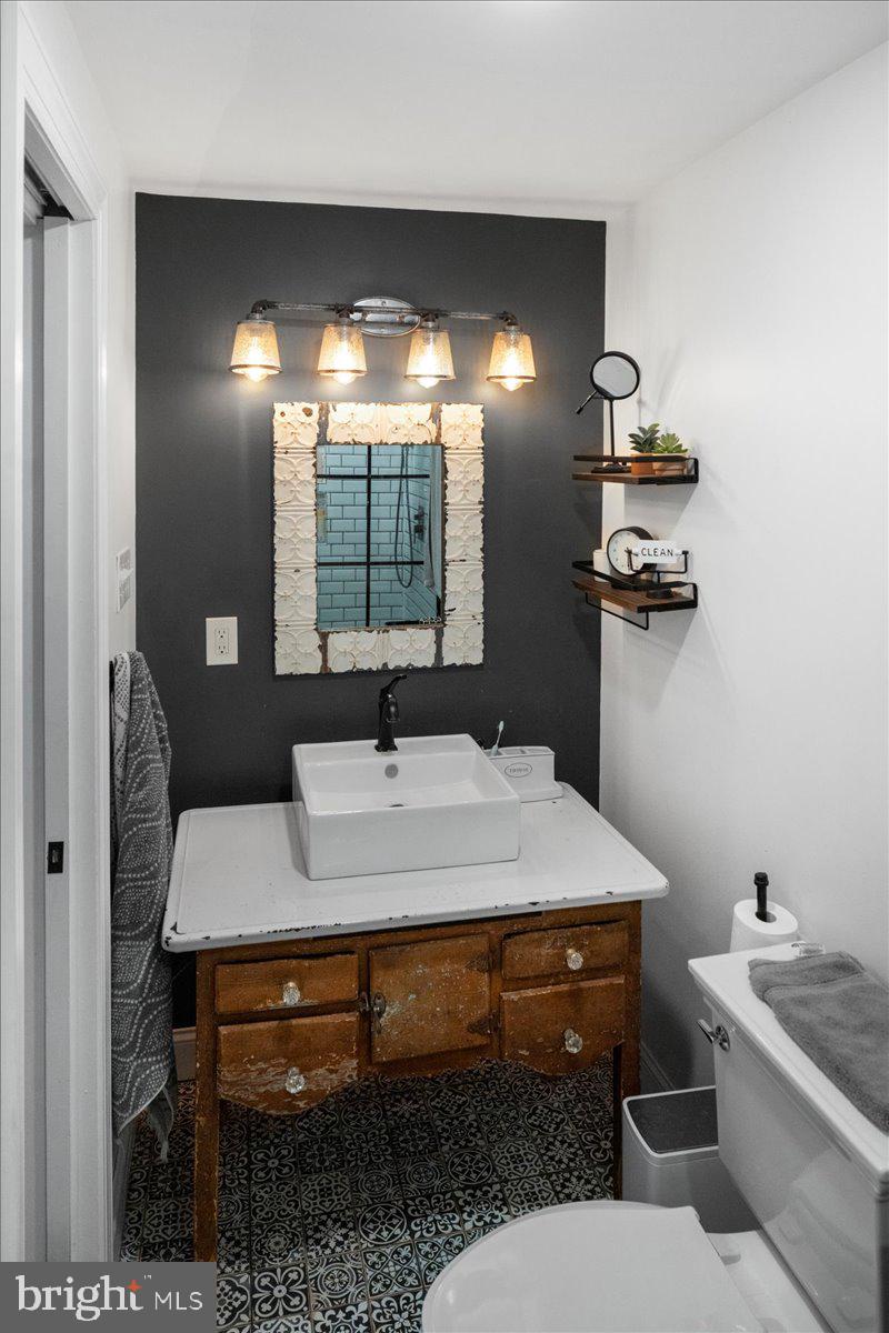 502 East Creamery Road Perkasie, PA 18944 - Photo 47 of 58 a bathroom with a sink and a mirror