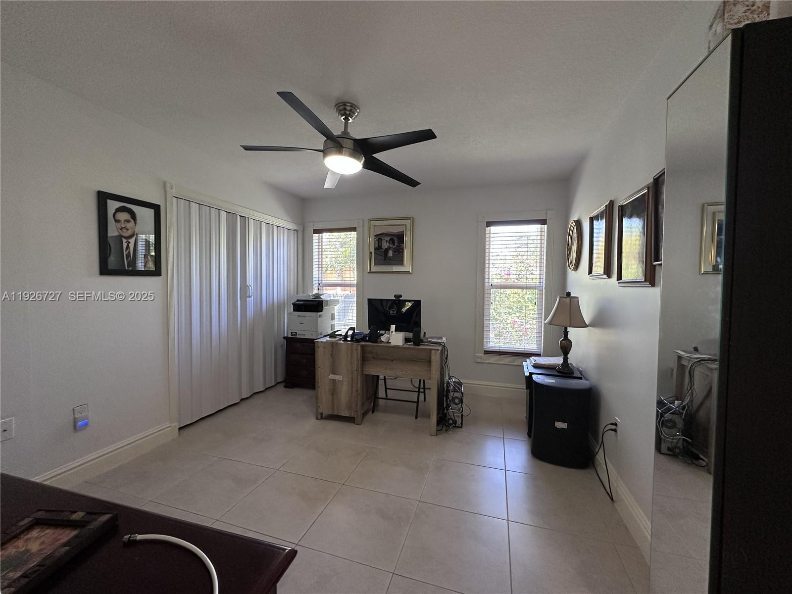 165 Southwest 130th Avenue Miami, FL 33182 - Photo 12 of 20 a living room with furniture