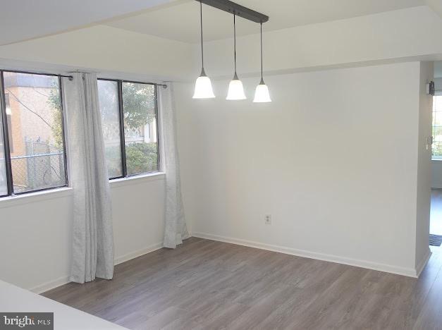 5 Christopher Road Voorhees, NJ 08043 - Photo 13 of 31 an empty room with wooden floor and windows