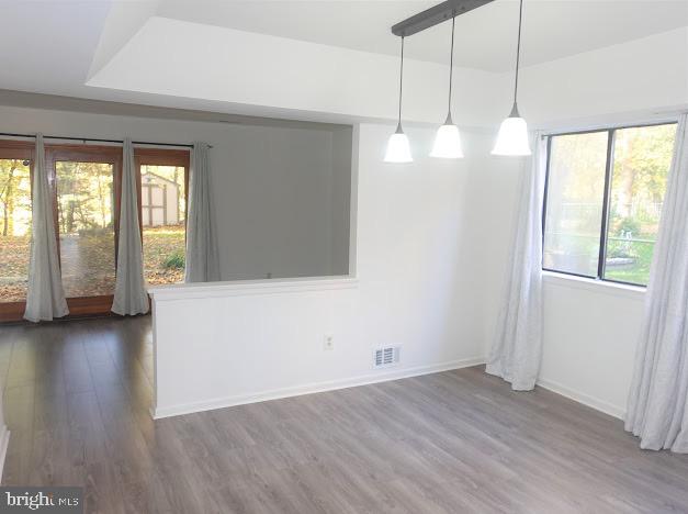 5 Christopher Road Voorhees, NJ 08043 - Photo 15 of 31 a view of an empty room with window and wooden floor