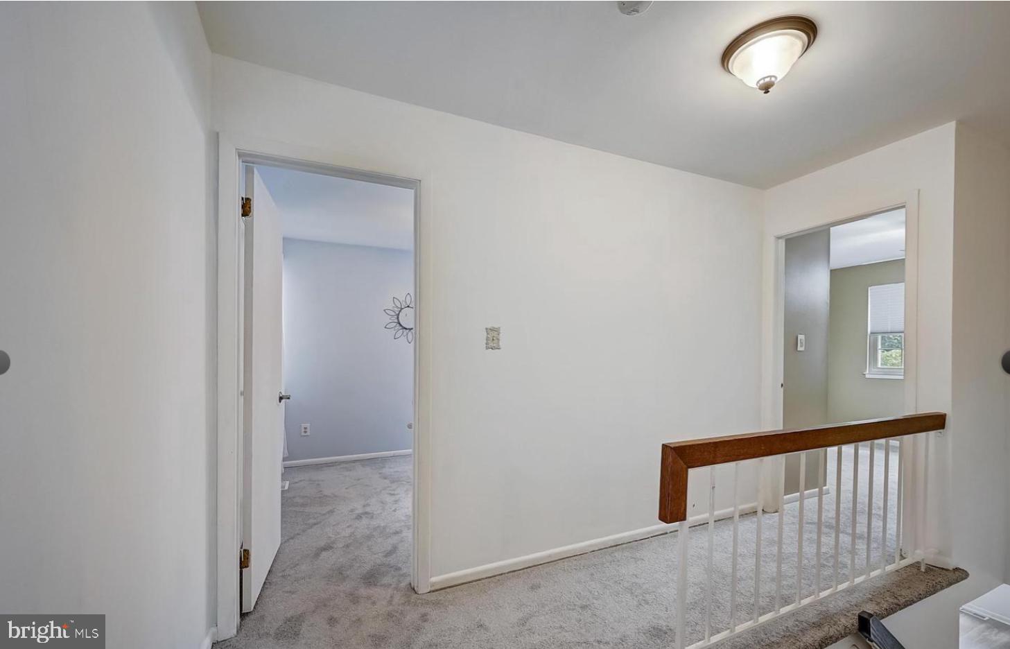 5 Christopher Road Voorhees, NJ 08043 - Photo 18 of 31 wooden floor in a hall with a window