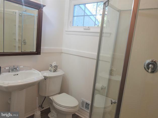 5 Christopher Road Voorhees, NJ 08043 - Photo 20 of 31 a bathroom with a toilet sink and mirror