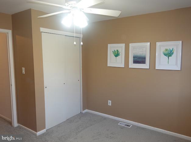 5 Christopher Road Voorhees, NJ 08043 - Photo 26 of 31 an empty room with windows and fan