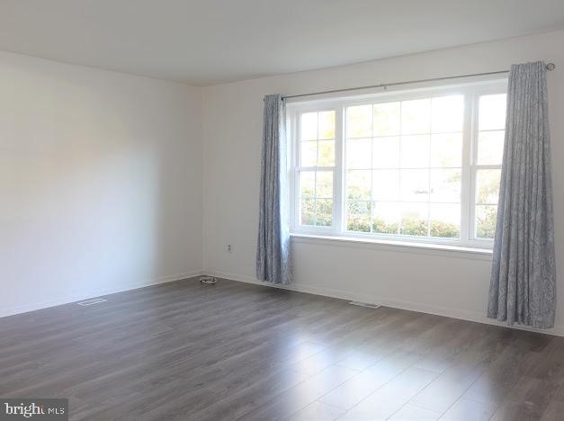 5 Christopher Road Voorhees, NJ 08043 - Photo 10 of 31 an empty room with wooden floor and windows
