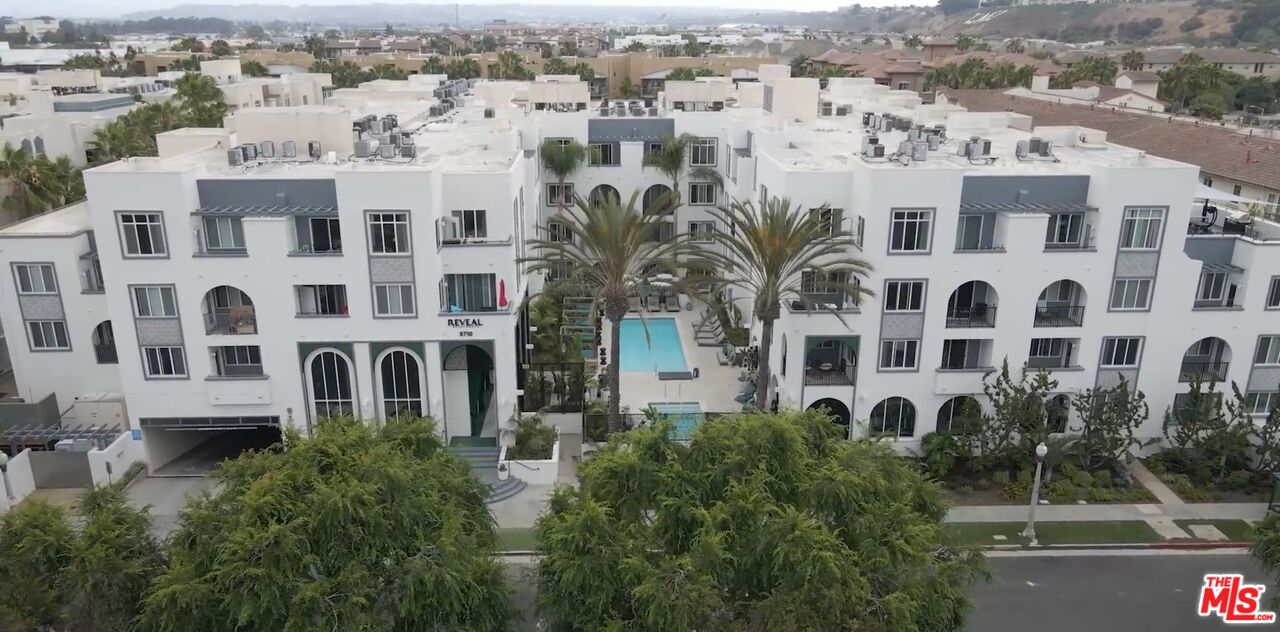 5710 Crescent Park East, Unit 209 Playa Vista, CA 90094 - Photo 1 of 29 a view of a building with a garden