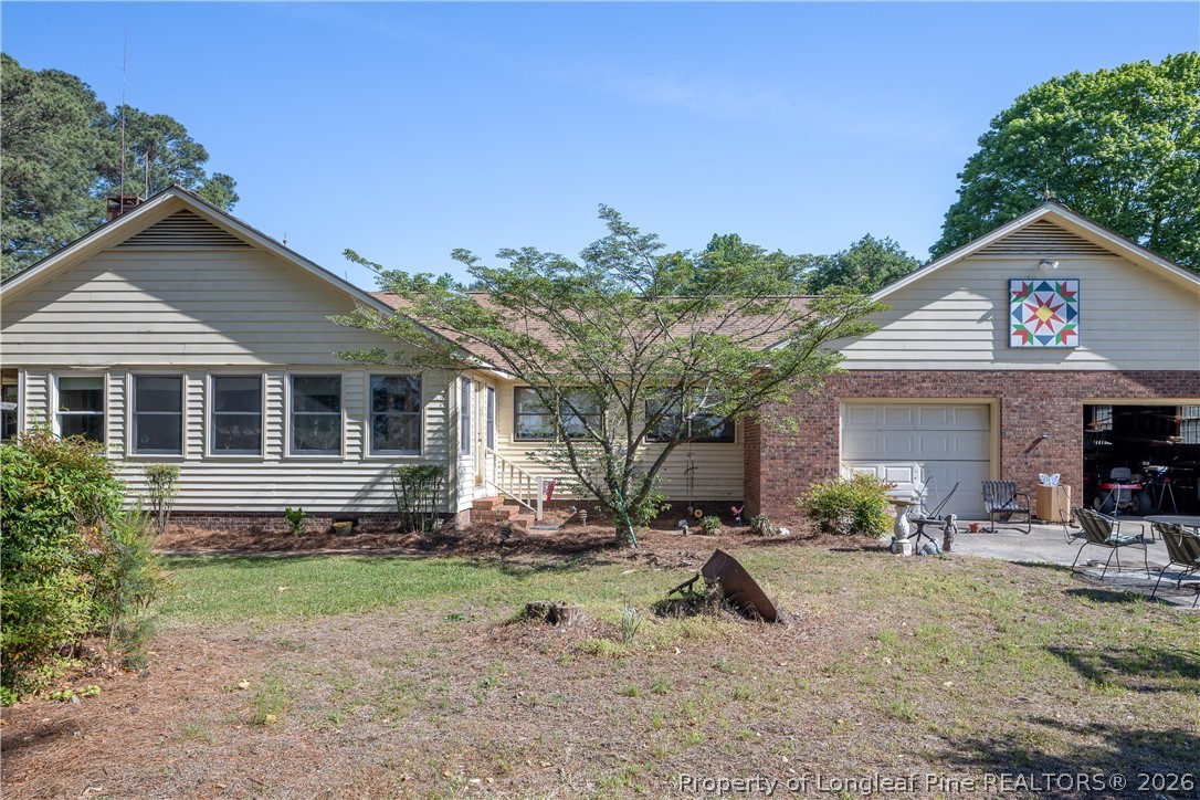 6346 Dunn Road Roseboro, NC 28382 - Photo 39 of 39 a front view of a house with garden