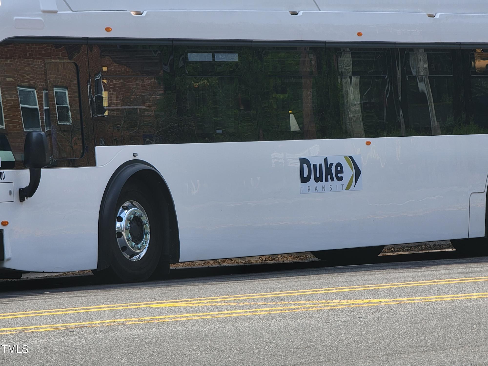 929 Morreene Road, Unit A13 Durham, NC 27705 - Photo 18 of 18 a utility room with washer and dryer