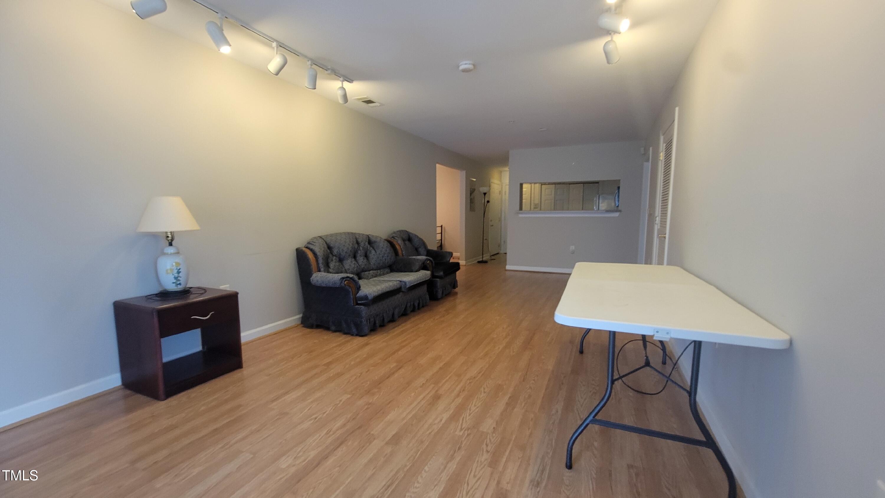 929 Morreene Road, Unit A13 Durham, NC 27705 - Photo 5 of 18 a living room with furniture