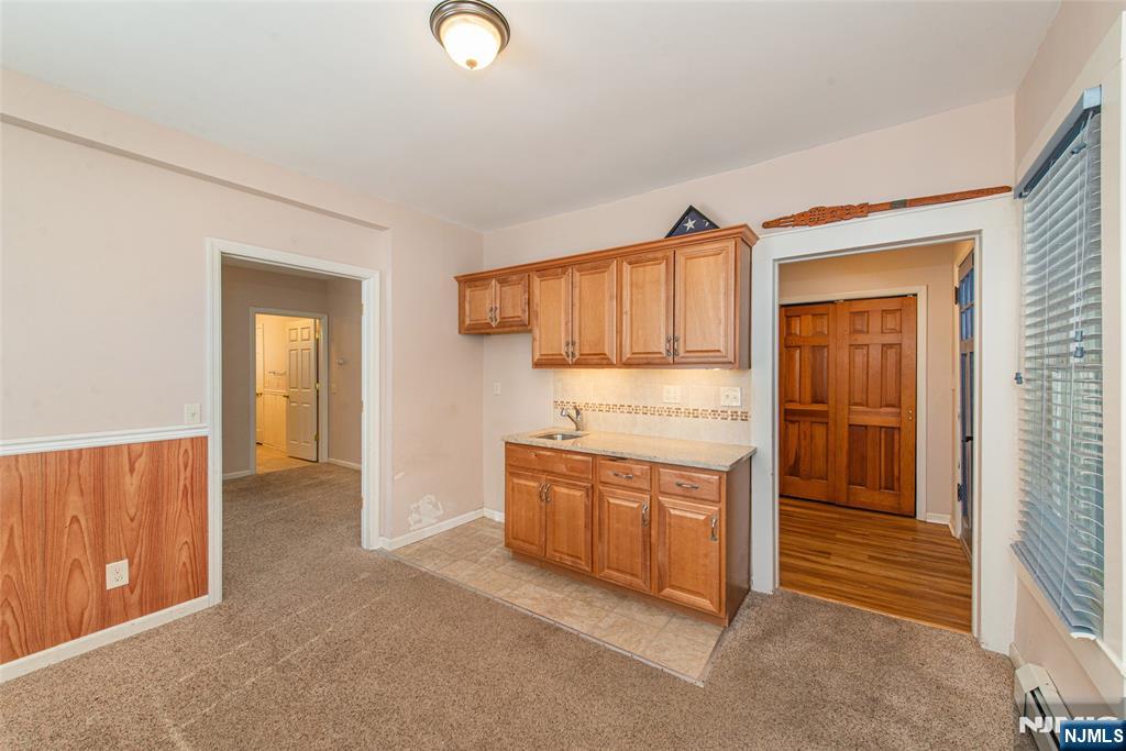 573 Wyckoff Avenue Mahwah, NJ 07430 - Photo 12 of 30 an empty room with mirror