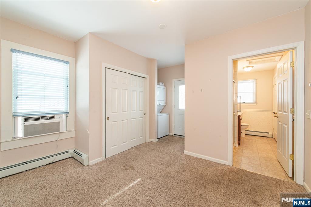 573 Wyckoff Avenue Mahwah, NJ 07430 - Photo 13 of 30 an empty room with windows and closet