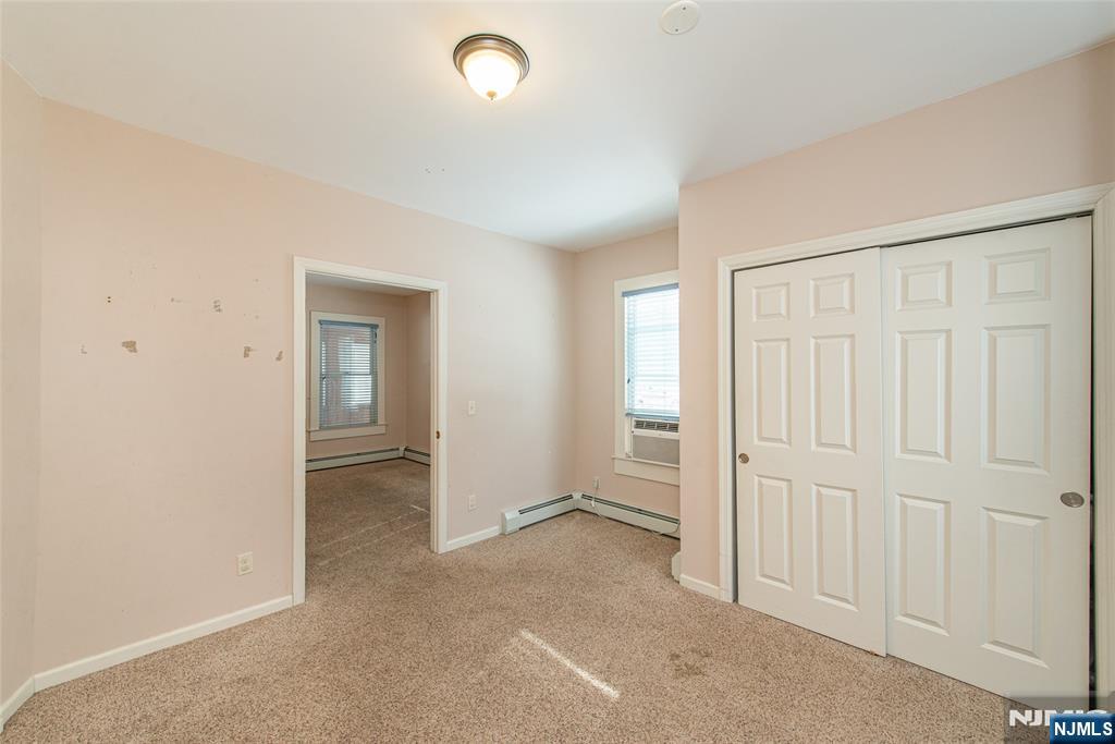 573 Wyckoff Avenue Mahwah, NJ 07430 - Photo 14 of 30 an empty room with windows