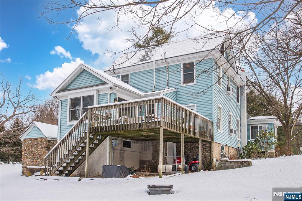 573 Wyckoff Avenue Mahwah, NJ 07430 - Photo 22 of 30 a front view of a house with balcony